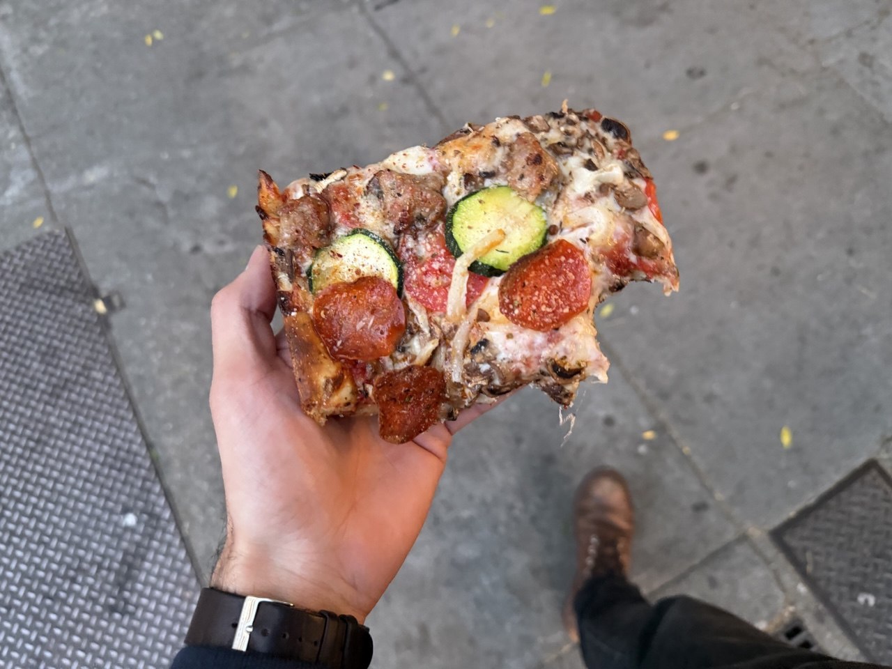 Pizza slice on the street